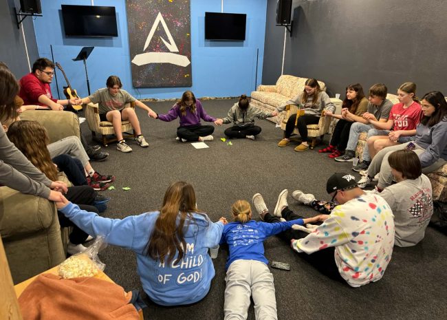 prayer circle in youth room